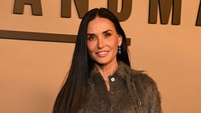 Demi Moore's sparkly skirt and cosy knitwear combination is the festive outfit formula we're wearing on repeat