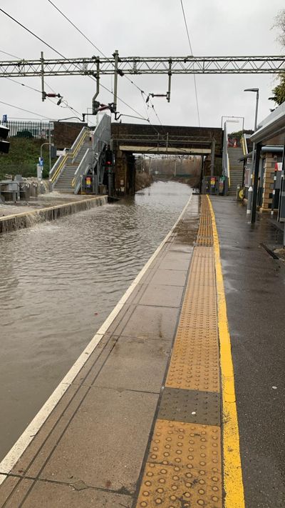 Shocking pictures show train station outside London completely flooded as it’s closed until Christmas Eve