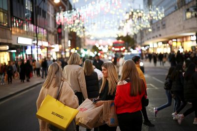 West End defies retail slump as Christmas shoppers flock to Oxford Street