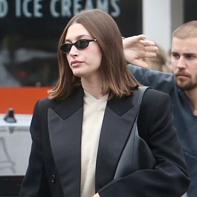 Hailey Bieber Elevates 2025's Sweatpants and Slippers Trends With an Oversize Leather Tote and a Long Winter Coat