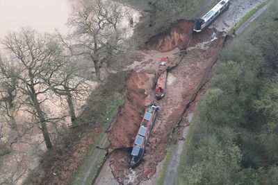 More than 10 rescued after huge sinkhole opens in canal in ‘major incident’