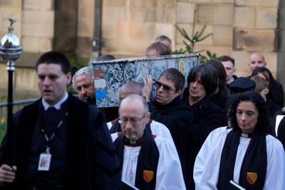 Manchester music and football stars gather for funeral of Stone Roses’ Mani
