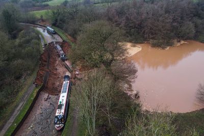 Stretch of canal dammed off after ‘sinkhole’ leaves 10 needing rescue