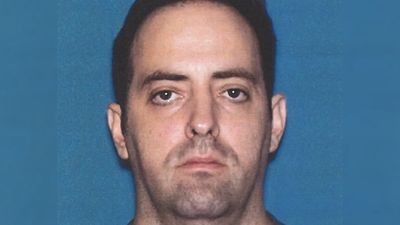 Random bow-and-arrow attack leaves New Jersey man dead, as suspect barricades himself in his house and lights it on fire