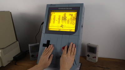 Modder builds giant Game Boy featuring a dreamy electroluminescent screen driven by custom graphics adapter — DIY retro console is fully functional with working buttons