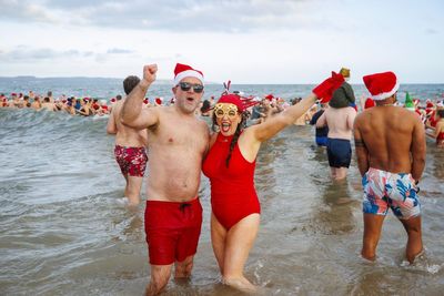 Hundreds brave the cold to make a splash for charity
