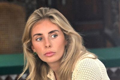 Bonnie Blue insults Indonesia by dragging flag along ground as she ‘goes to pay fine’ for Bali stunt