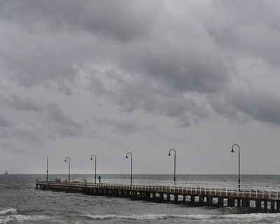 Paddle boarders rescued after being swept more than 10km across Port Phillip Bay in three-hour ordeal