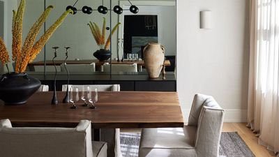 3 Places You Should Never, Ever Hang a Wall Sconce to Avoid "Disrupting Symmetry, Creating Strange Shadows, or Visually Reducing the Space"