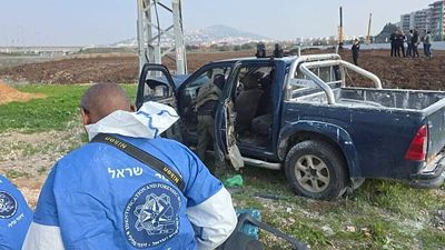 Palestinian man kills two in car and knife attack in northern Israel