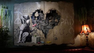 Banksy's Walled Off Hotel reopens in Bethlehem after two-year closure