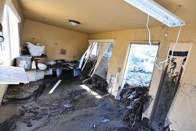 Photos show California homes buried in mud and debris during Christmas storms