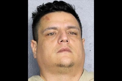 Suspect arrested after stabbing his pregnant wife to death in front of their other children, cops say