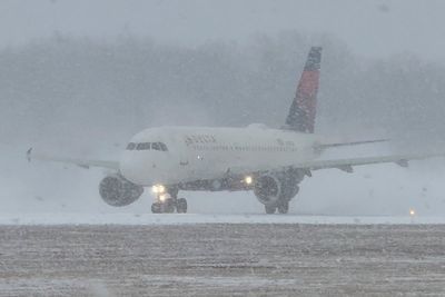 Thousands of flights delayed or canceled as snow sweeps Northeast