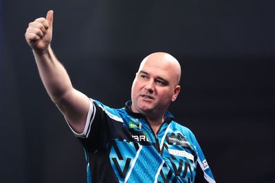 Rob Cross thrashes Damon Heta to set up Luke Littler showdown in last 16