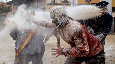 Els Enfarinats: Revelers battle with flour and eggs in traditional Spanish festival