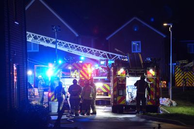 Child dies and another taken to hospital after house fire