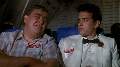 Colin Hanks Remembers The First Time John Candy's Family Came To Dinner (And How Tom Hanks Heroically Saved A Lost Toy In Typical Woody Fashion)
