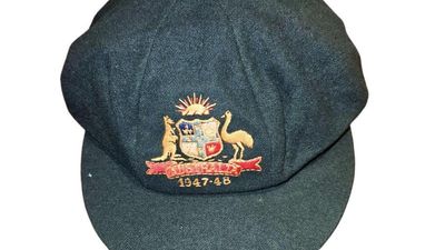 Bradman's baggy green goes under the hammer