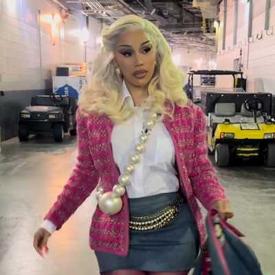 Cardi B Styles an Archival Runway Look and Rare $41,000 Chanel Necklace-Bag for the New England Patriots Game
