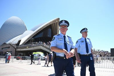 Sydneysiders urged to ‘show defiance’ after Bondi attack by coming out for New Year’s Eve, as police presence ramps up