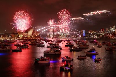 Sydney’s New Year’s Eve fireworks draw large crowds as people asked to ‘show defiance’ after Bondi attack