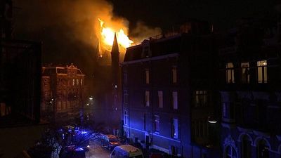 Two dead and church gutted by fire in 'unprecedented' New Year's violence in the Netherlands