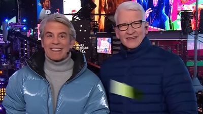 Andy Cohen Getting Anderson Cooper To Recite Taylor Swift’s ‘Wood’ Was The Giggle-Filled Start I Needed For 2026
