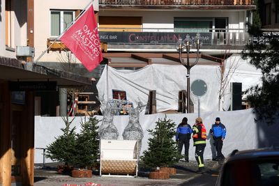 Swiss authorities launch criminal probe into ski bar owners over deadly fire