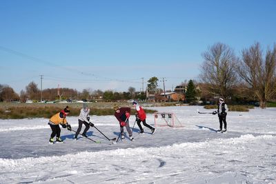 Schools closed and flights cancelled as warnings for snow and ice in force