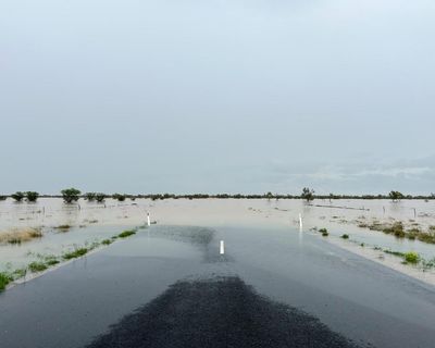 ‘You’re ringing an old lady in outback Queensland for life advice’: travellers worried about floods skip AI and pick up the phone