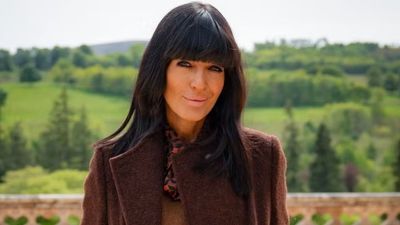 Claudia Winkleman's earthy mix of printed culottes, tan boots and a chocolate brown coat is her chicest Traitors look yet
