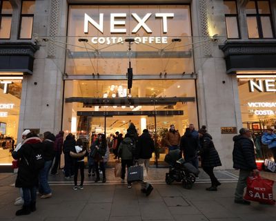 Next expects profits to top £1.1bn after bumper festive sales