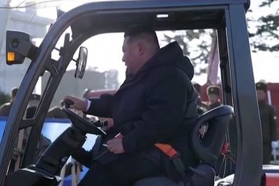 North Korea leader Kim Jong Un drives pallet truck to plant tree at memorial service