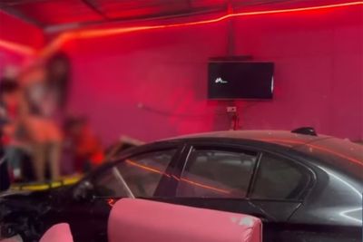 BMW driver crashes into karaoke bar, injures 8