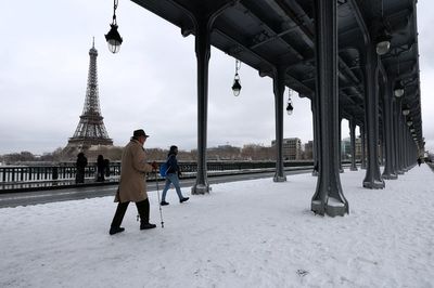 Thousands stranded in Paris and Amsterdam and multiple deaths as Arctic blast sweeps Europe