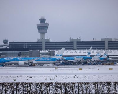 Amsterdam airport cancels at least 800 flights because of snow and wind
