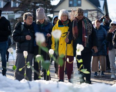 ‘This is not normal’: Minneapolis on edge and angry after ICE killing of woman amid federal surge
