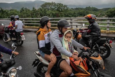 ‘We can’t take it any more’: thousands flee guerrilla clashes on Colombia-Venezuela border