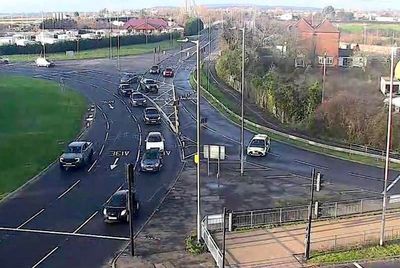 Three police officers and two paramedics hit by van at scene of crash