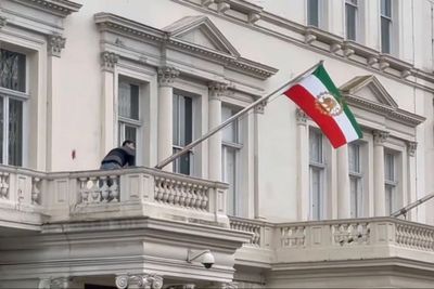 Protester tears down Iranian flag from London embassy