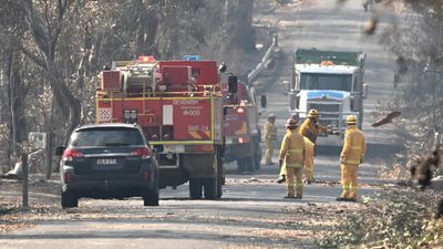 Premier hoses down fire funds row, as victim identified