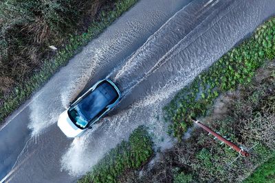 Flooding and landslide bring disruption amid heavy rainfall