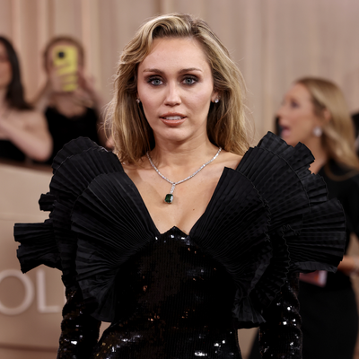 Miley Cyrus Leans Into the '80s Runway Trend in Saint Laurent Gown at the 2026 Golden Globes