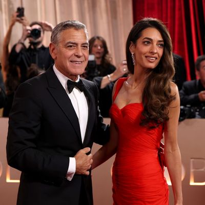 Amal Clooney Makes First Golden Globes Appearance in 10 Years in Striking Balmain Dress