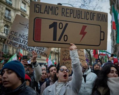 Iran holds pro-government rally as regime seeks to downplay protests