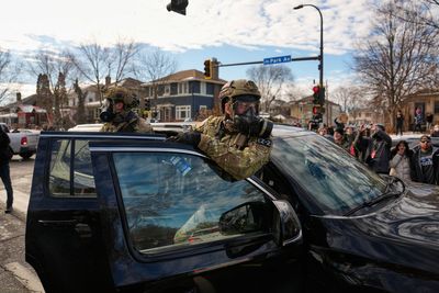 Photos of tensions between federal officers and locals in Minneapolis