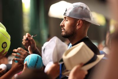 Nick Kyrgios delights rowdy fans as tennis cultures clash at Kooyong Classic