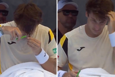 Bizarre moment tennis player gives himself haircut mid-match in bid to win