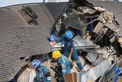 At least 31 killed as crane collapses onto train in Thailand ‘slicing it in half’